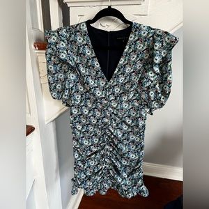 Endless rose mini dress with blue, white, green and peach floral pattern.